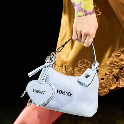 Prada completes Versace acquisition Prada completes Versace acquisition